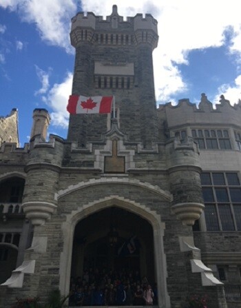 The front of a castle looking building
