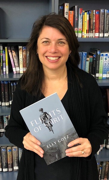 A woman holding a book